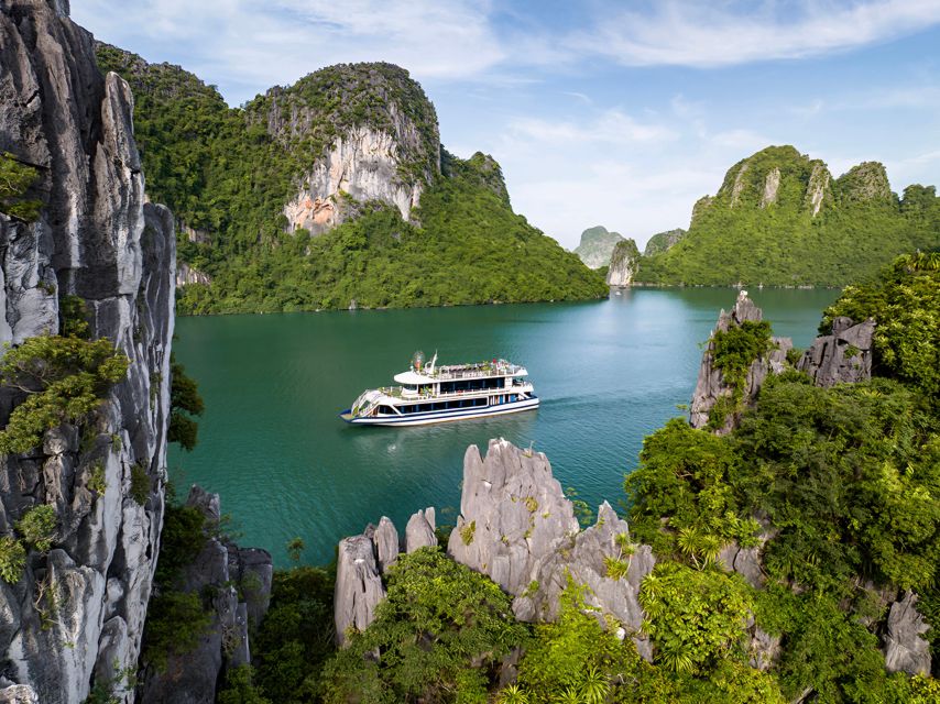 Halong Bay Luxury Cruise with Kayaking & Lunch Buffet - Sunset Party on the Bay: Tea, Fruit, Cake, and a Little Red Wine