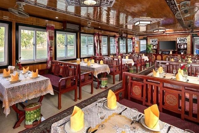 Halong Islands, Caves, Kayak, Lunch day tour w Dragonfly Cruise - Ba Hang: kayaking or a bamboo boat for hands-on Bay time