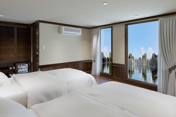 Halong Luxury Cruise 2D/1N: Kayaking, swimming, Surprise cave, Titop island - Night onboard: spring rolls, squid fishing, BBQ, and a chance to socialize