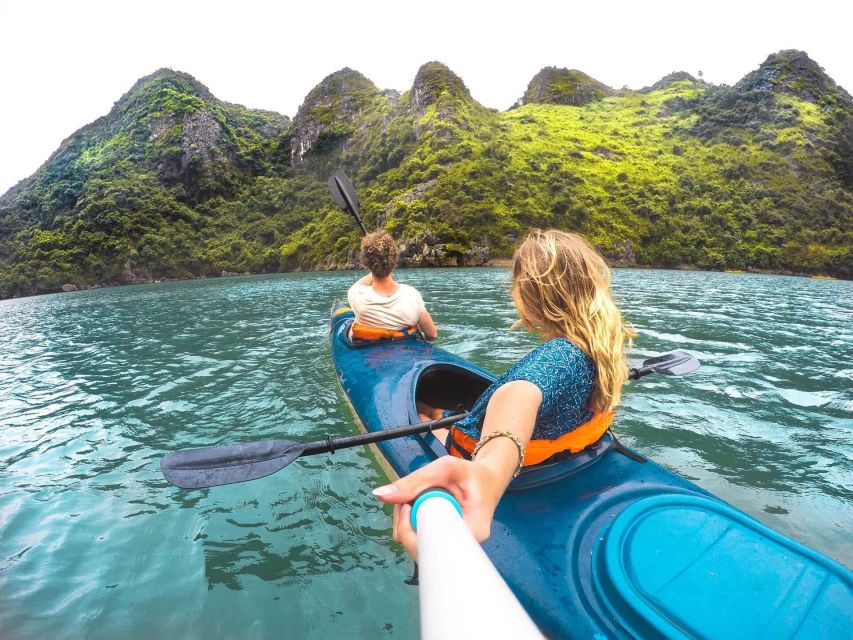 Hanoi: Halong Bay Day Trip with Titop Island, Cave, & Kayak - Luon Cove kayaking or bamboo-boat rowing: the bay’s narrow-water version