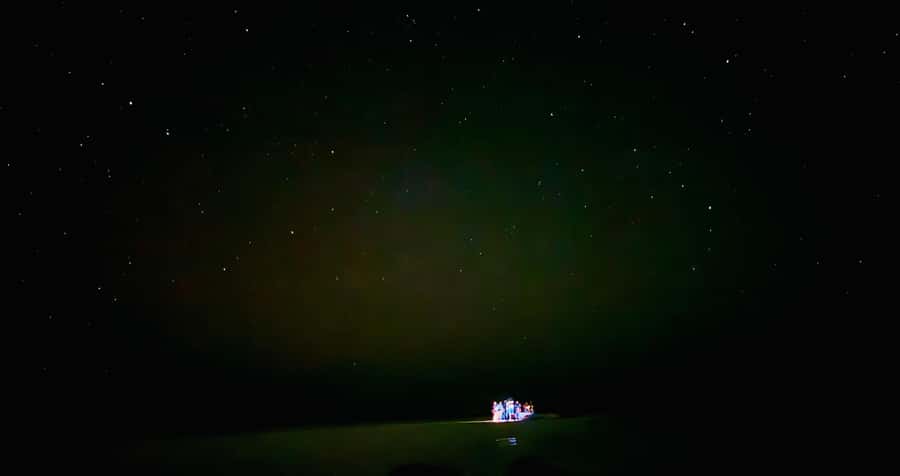 Holbox: Bioluminescence by Kayak and Stargazing. - Walking the sandbar: glowing footprints in blue-green dots