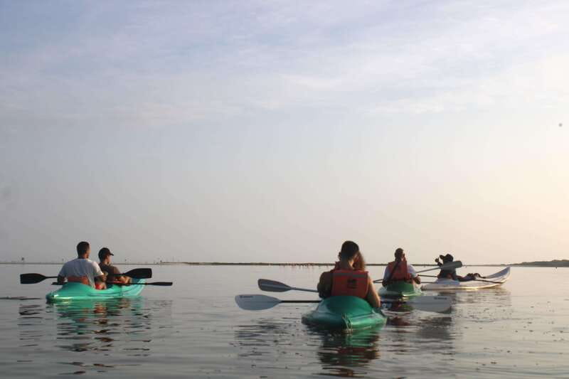 Holbox: Guided Sunrise/Sunset Kayak Tour by Mangrove Reserve - Getting to the water: pickup by golf cart and a quick prep