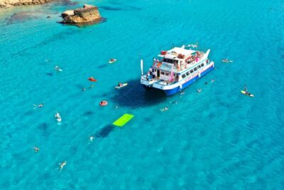 Ibiza: Beach Hopping Cruise w/ Paddleboard, Food, & Drinks - Unlimited drinks and buffet food on a boat that actually runs the show