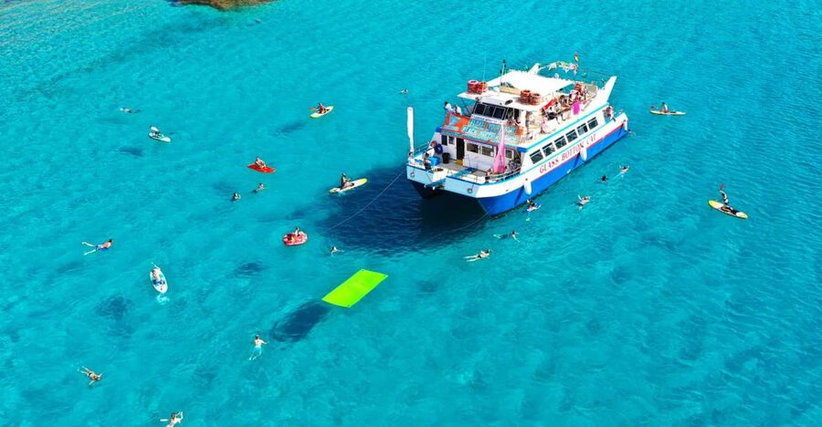 Ibiza: Beach Hopping Cruise w/ Paddleboard, Food, & Drinks - Onboard setup: glass-bottom deck, water slides, and comfort you can use