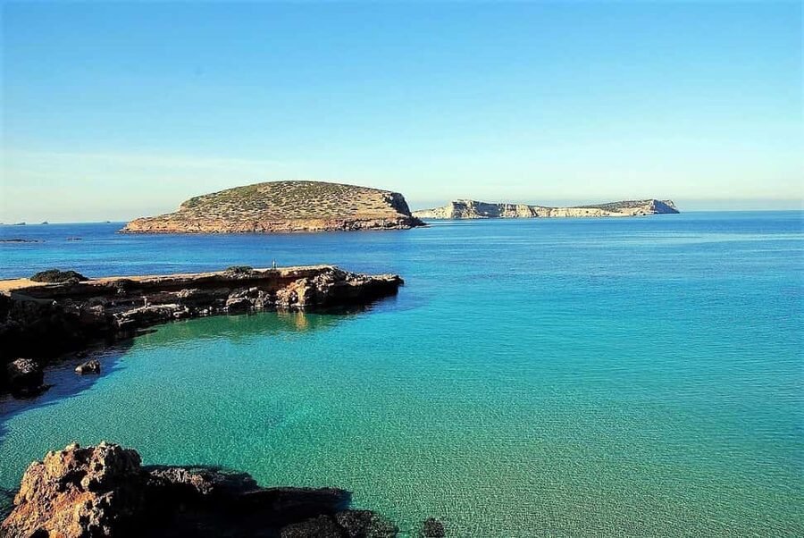 Ibiza: Snorkeling and SUP Paddle, Beach and Cave Boat Tour - Cala Bassa: the turquoise-and-sand start for snorkeling and SUP
