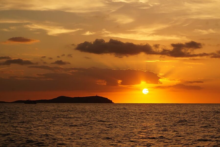 Ibiza: Sunset Boat Trip with Snorkeling, Kayaking, & Drinks - A classic Ibiza party boat, with real time in the water