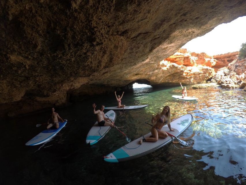 Ibiza: SUP & Snorkel Boat Tour with Caves, Drinks & Photos - Snorkeling in crystal-clear water with professional gear