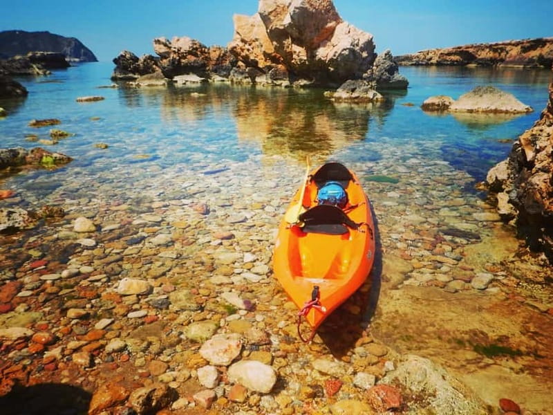 Ibiza: Xarraca Bay Guided Kayaking Tour - Black Point cliff-jumping: the adrenaline finish you should plan for