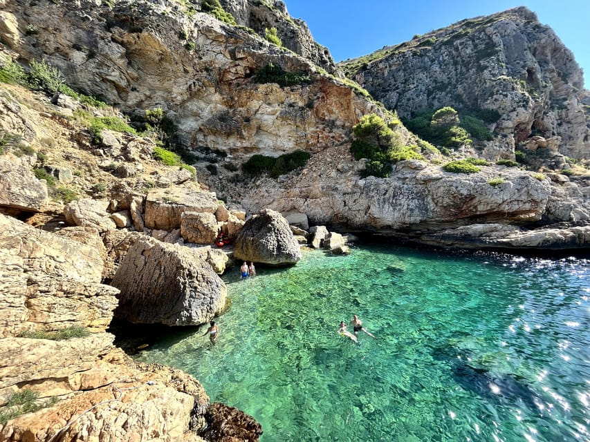 Jávea: Cala Tango and San Antonio Nature Reserve Kayak Tour - Platja del Pope pass-by: a calm warm-up