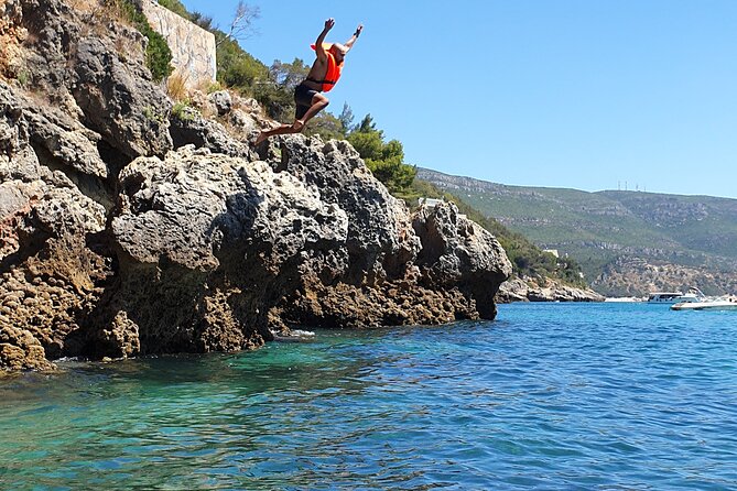 Kayak and Snorkeling Adventure in Lisbon - Kayaking through caves, hidden beaches, and cliff-jump moments