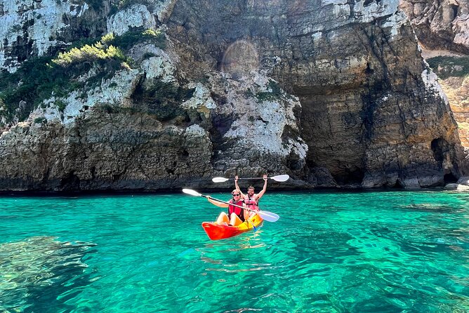 Kayak Paradise: Cala Portixol Snorkel, Cave & Cliff Jumping Tour - Cala el Pom snorkel stop: clear water and underwater caves