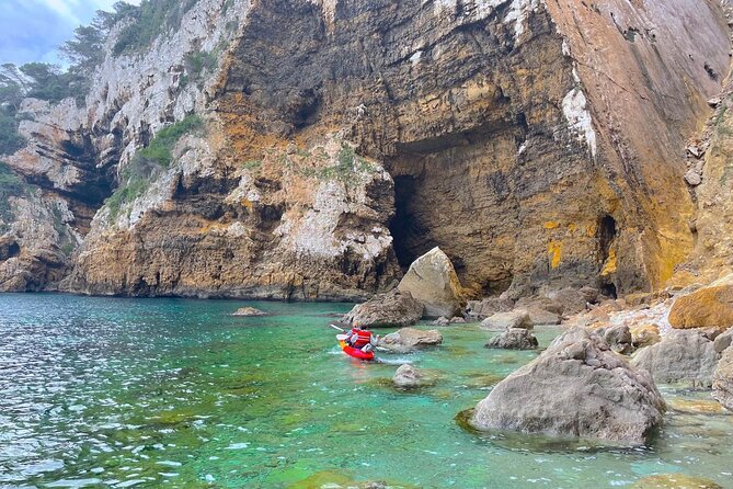 Kayak Paradise: Cala Portixol Snorkel, Cave & Cliff Jumping Tour - Isla de Portixol: secret cave photos and the blue lagoon pool