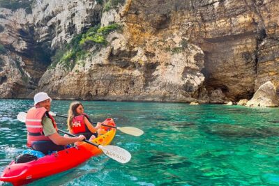 Kayak Paradise: Cala Portixol Snorkel, Cave & Cliff Jumping Tour - Cap Negre headland: the 100-meter rock moment