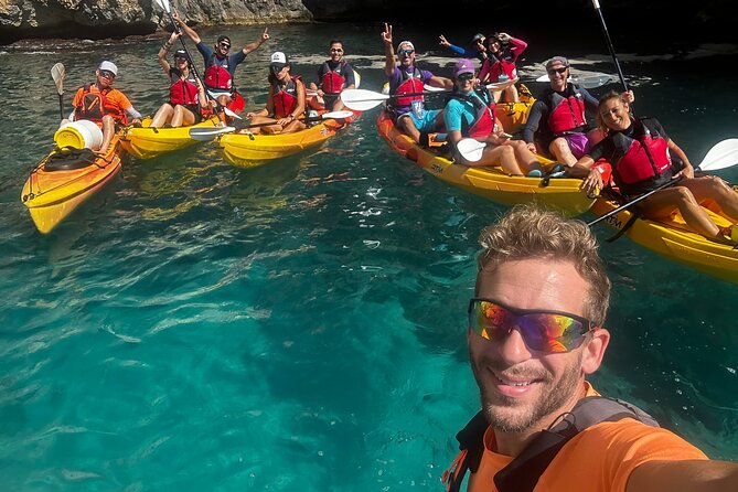 Kayak route through Cala Granadella - Llop Marí Cave: the story behind the dark tunnels