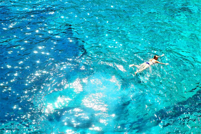Kayak Secret Beach - Cala Estremer landing: rock walls, snorkel time, and optional jumps