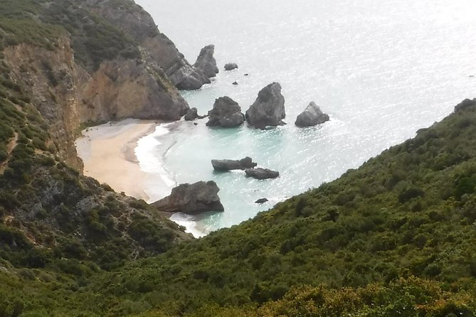 Kayak tour from Sesimbra to Ribeira do Cavalo Beach, passing through the caves - On-Water Stops, Toasted Flour Sweet, and the Pace of the Trip