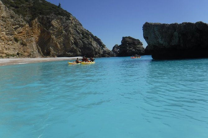 Kayak tour from Sesimbra to Ribeira do Cavalo Beach, passing through the caves - Moderate Fitness, Group Size, and Paddling Reality