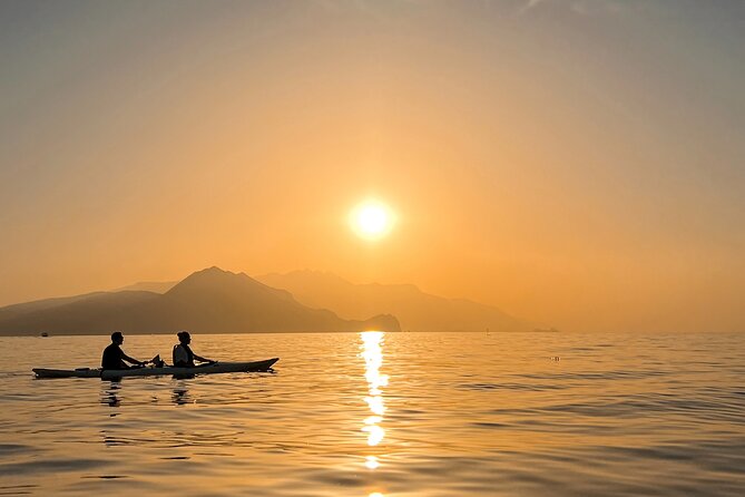 Kayak tour in Capri between caves and beaches. Photos included. - Optional Swim Stop: Capri’s Clear Water Up Close