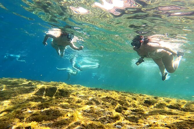 Kayaking Adventure Route with Snorkeling in Mogan Caves - Beach Time, Sunbathing Breaks, and the Cliff-Jump Factor