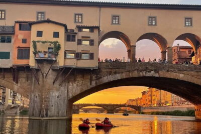 Kayaking on the Arno River in Florence under the Pontevecchio Arcade - The raft: stable, safe-feeling, and a little different to steer