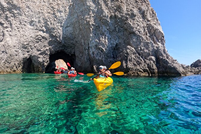 Kayaking Tour to the secrets of Milos - How Hard Is It Really? Swimming Skills, Wind, and Tandem Coordination