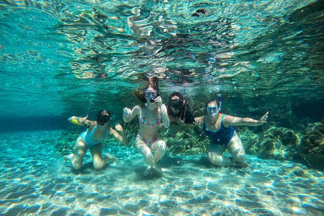 Kayaking Tour to the secrets of Milos - Gerakas Bay: The Sea-Only Beach with Sand-Falls and White Volcanic Rocks