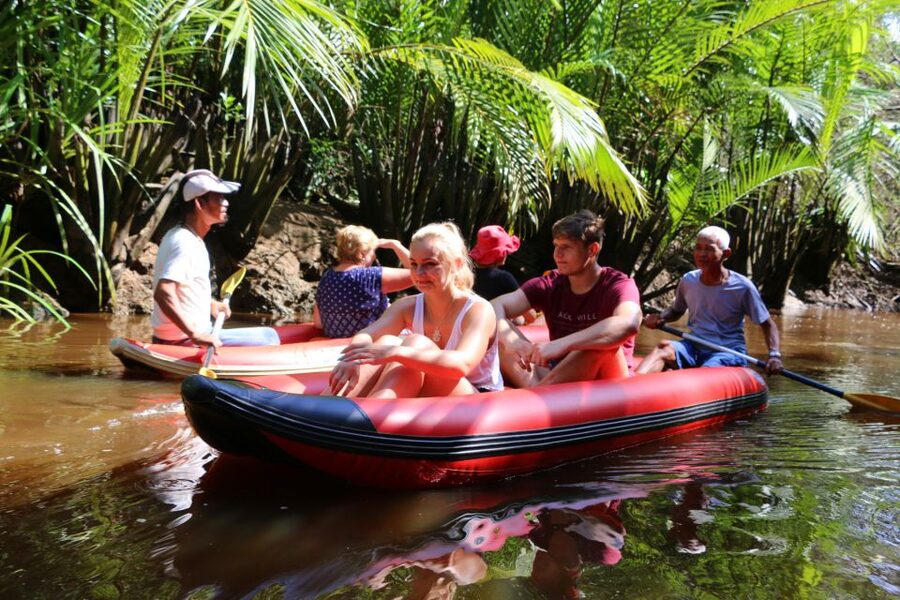Khao Lak: Sri Phang Nga Canoe and Tam Nang Waterfall Tour - Takuapa market: where curry spices become souvenirs