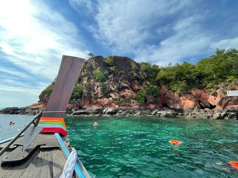 Krabi: Hong Island Longtail Boat & Kayak Tour w Buffet Lunch - Koh Daeng snorkeling: clear water, coral below, and sea reality
