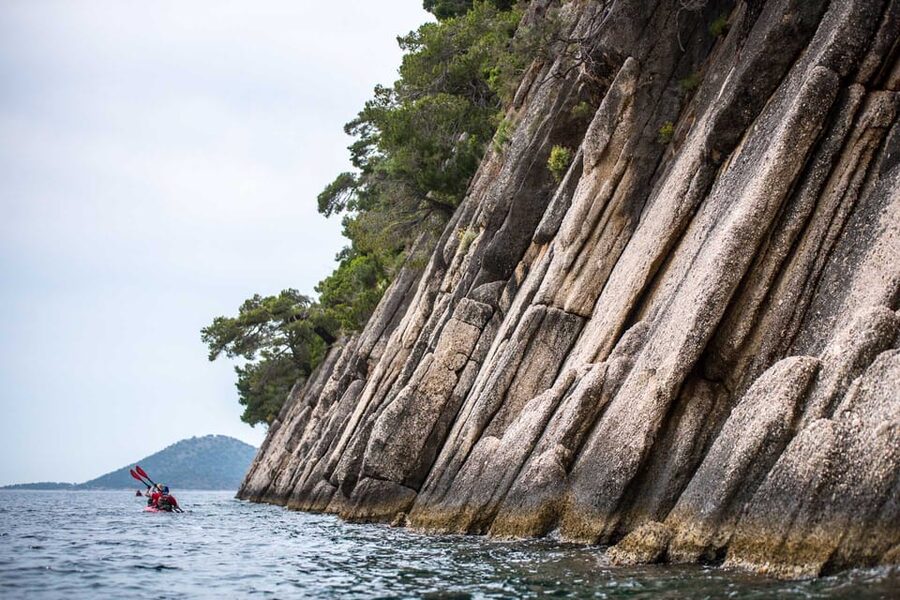 Lefkada: Blue Cave Kayak Tour with a Taste of Greece - Rouda Bay Paddle: Sea Cliffs, Cave Approach, and Wind Reality