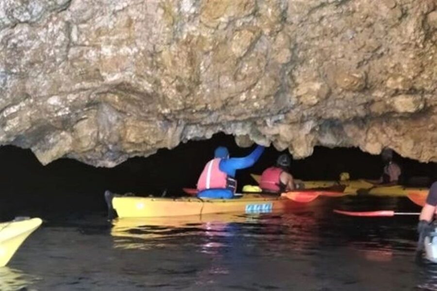 Lefkada: Hidden Blue Cave Kayak Trip with Lunch & Fruits - Entering the hidden Blue Cave for that blue glow