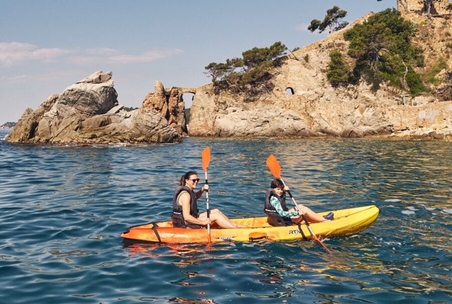 Lloret de Mar: Costa Brava Kayak Tour and Swimming - Guides, local stories, and what you’ll learn from the water