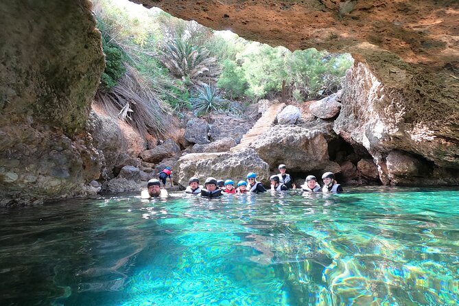 Mallorca: Kayaking, Sea Cave, Cliff Jumping & Snorkel Tour - Sea cave treasure hunt: helmets, light, and getting close to the rock