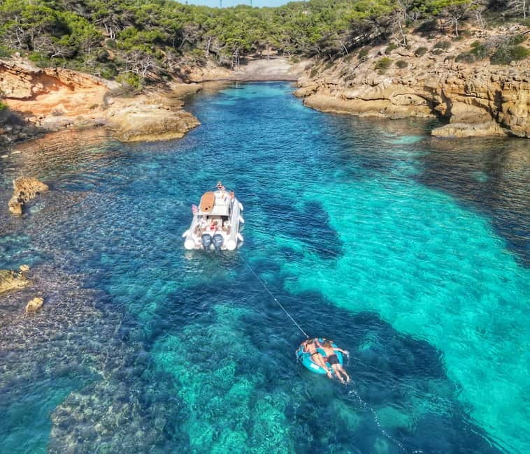 Mallorca: Private Watersports Boat. LUNCH Drinks SUP, Tubing - Private Boat Charter From Puerto Portals: Your Group Gets the Full Day