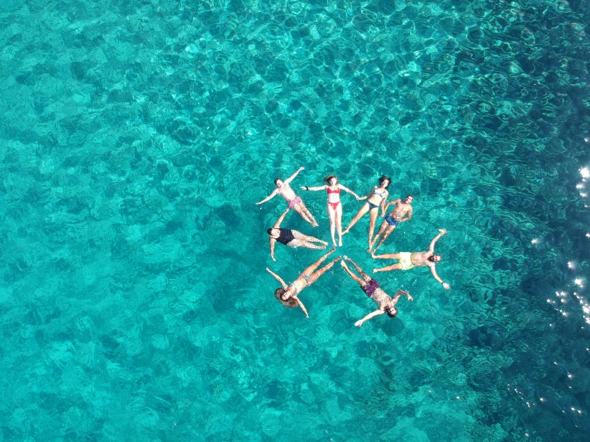 Milos: Full-Day Catamaran Cruise with Paddle Board - Food and drinks: Greek tapas, lunch, and an open bar that keeps things social