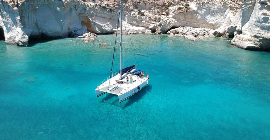 Milos: Full-Day Catamaran Cruise with Paddle Board - Early photo stops: catacombs, Klima, and the Arkoudes bear rocks