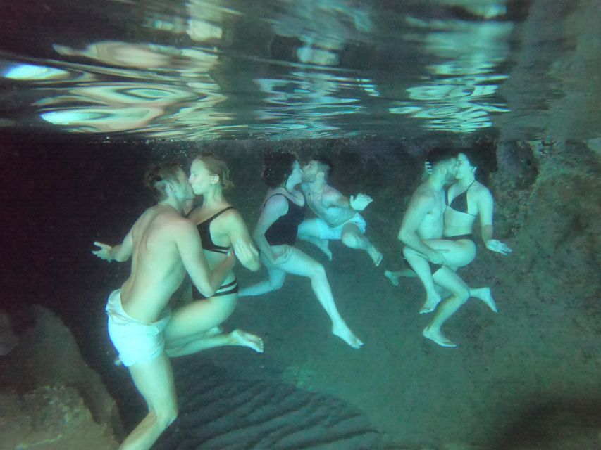 Milos: Full-Day Catamaran Cruise with Paddle Board - Kleftiko caves: pirate arches, long snorkeling time, and GoPro photos
