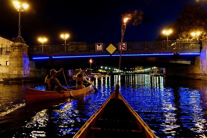 Night Canoe City Tour in Klaipeda - Passing under a bridge: where the tour stays fun