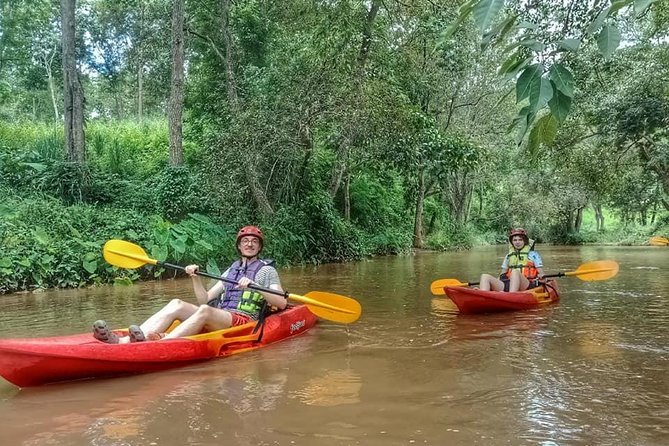 No.1 Full-Day Chiang Mai Caving & Jungle Kayaking: Chiang Dao - Base Camp before the water: kayak sizing, safety briefing, and real instruction