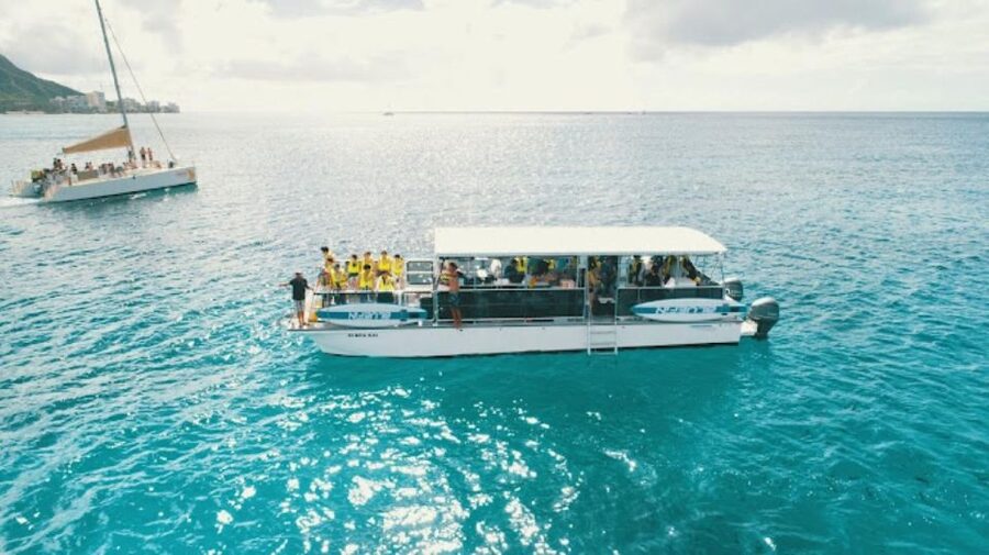 Oahu Snorkeling with Turtles, Water Scooter, Paddleboard - Turtle Canyon plus gadgets: the core idea in plain English
