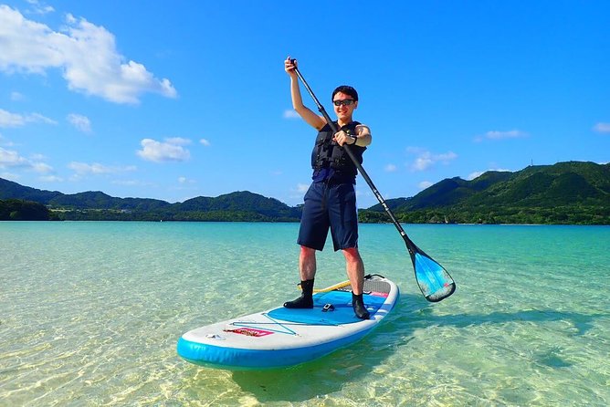 Okinawa Ishigaki Kabira Bay SUP or Canoe Tour - Timing, rain, and cancellation: how to plan your day