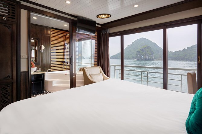 Overnight Luxury 5 Star Alisa Cruise with Meals, Kayak or Bamboo Boat - Day 1 from Tuan Chau: Caves, islands, and your one big choice