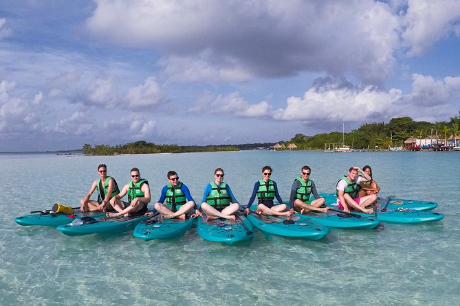 Paddleboarding and/or kayaking tour at sunrise in the lagoon of Bacalar - Guides in the lead: what “small group” really changes
