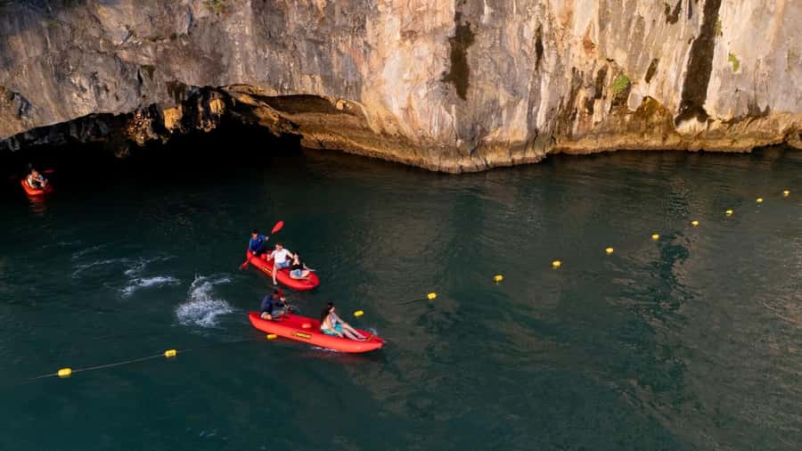 Phang-nga: James Bond Twilight Sea Canoe & Glowing Plankton - Phang Nga Bay at two times of day: caves in daylight and plankton after dark