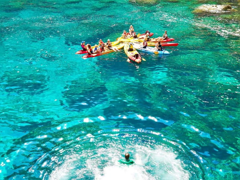 Pollença: Kayak Discovery – Snorkeling and Caves - Snorkeling and cliff-jumping: how the stop moments work in real life