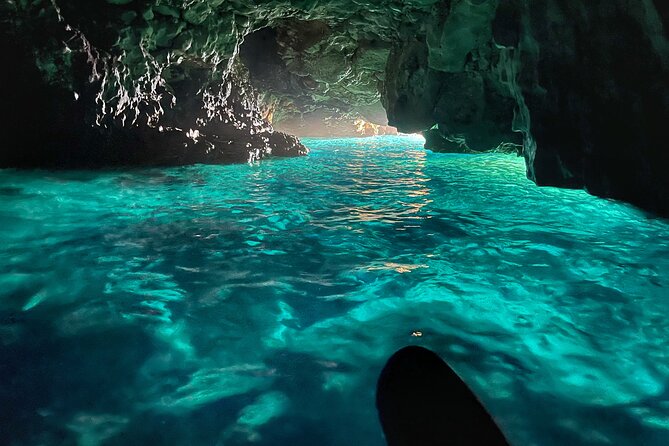Porto Selvaggio kayak tour + cliff diving + cold spring immersion - A 3-hour kayak-and-caves mix on the Ionian Salento coast