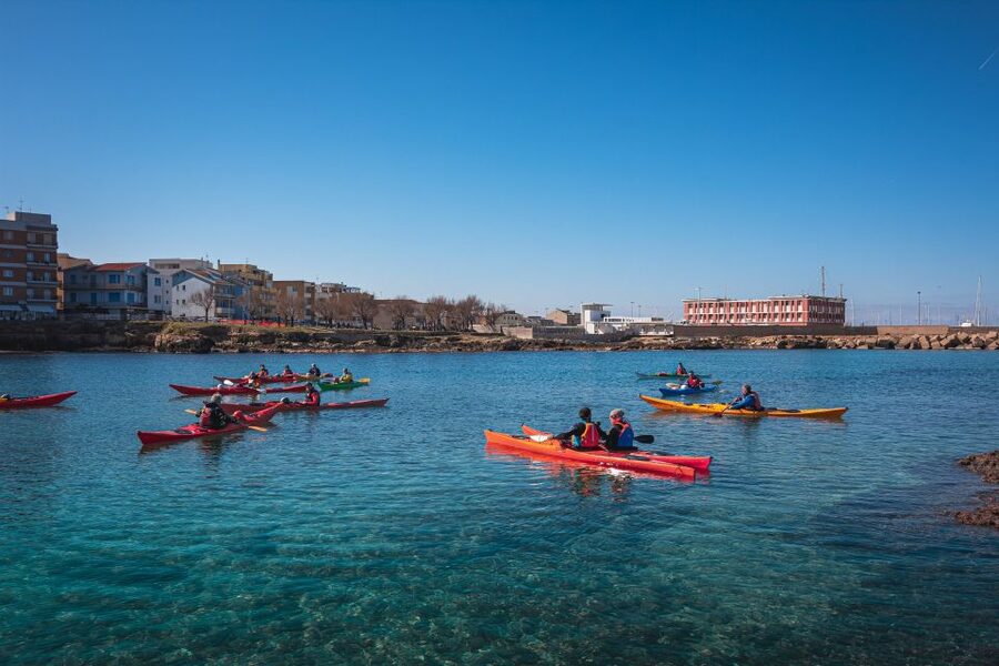 Porto Torres: Guided Kayaking Excursion - The 8 km Route: Inlets, Cliffs, and the Beach Stop You’ll Actually Enjoy