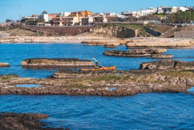Porto Torres: Guided Kayaking Excursion - Starting at Scogliolungo Beach: Finding the Launch and Settling In
