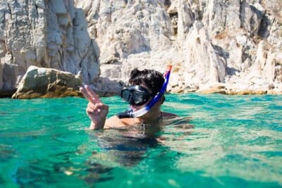 Private Los Cabos Arch and Playa del Amor Tour by Glass Bottom Kayak - Pelican Rock: your warm-up swim with real snorkel time