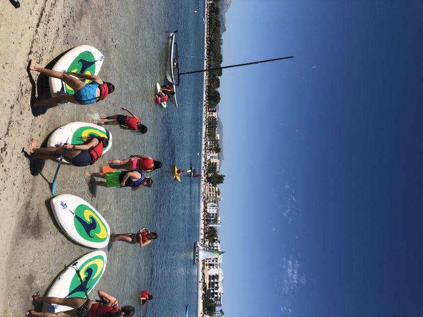 Puerto de Alcudia: Stand-Up Paddleboard Lesson - Meeting Wind Pirates and getting geared up at the beach base