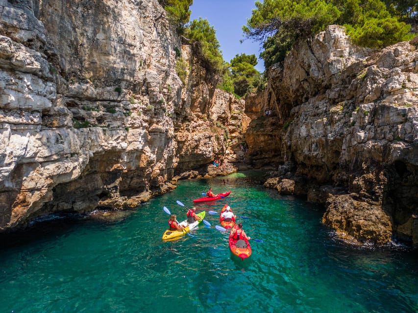 Pula: Kayak Adventure with Cave & Island Snorkeling - Verudela Canyon: gliding alongside cliffs and narrow water